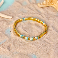 Metal and Enamel Gold Stretch Bracelet Gallery Thumbnail